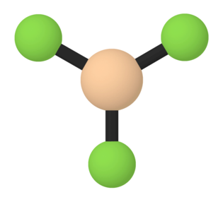 A model of a molecule containing one ball labeled B and three balls labeled F.