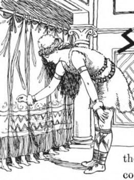 A young woman is indoors. She is leaning over and reaching out to touch a curtain. Under the curtain, she can see several pairs of small feet.