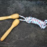 a jumprope with wooden handles