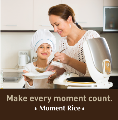 In the advertisement for Moment Rice, a parent and child cook rice together. The text says, "Make every moment count."