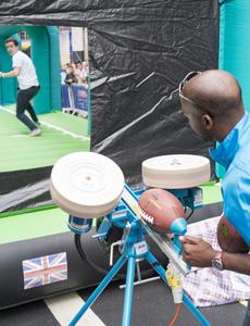 a device to launch a football through the air